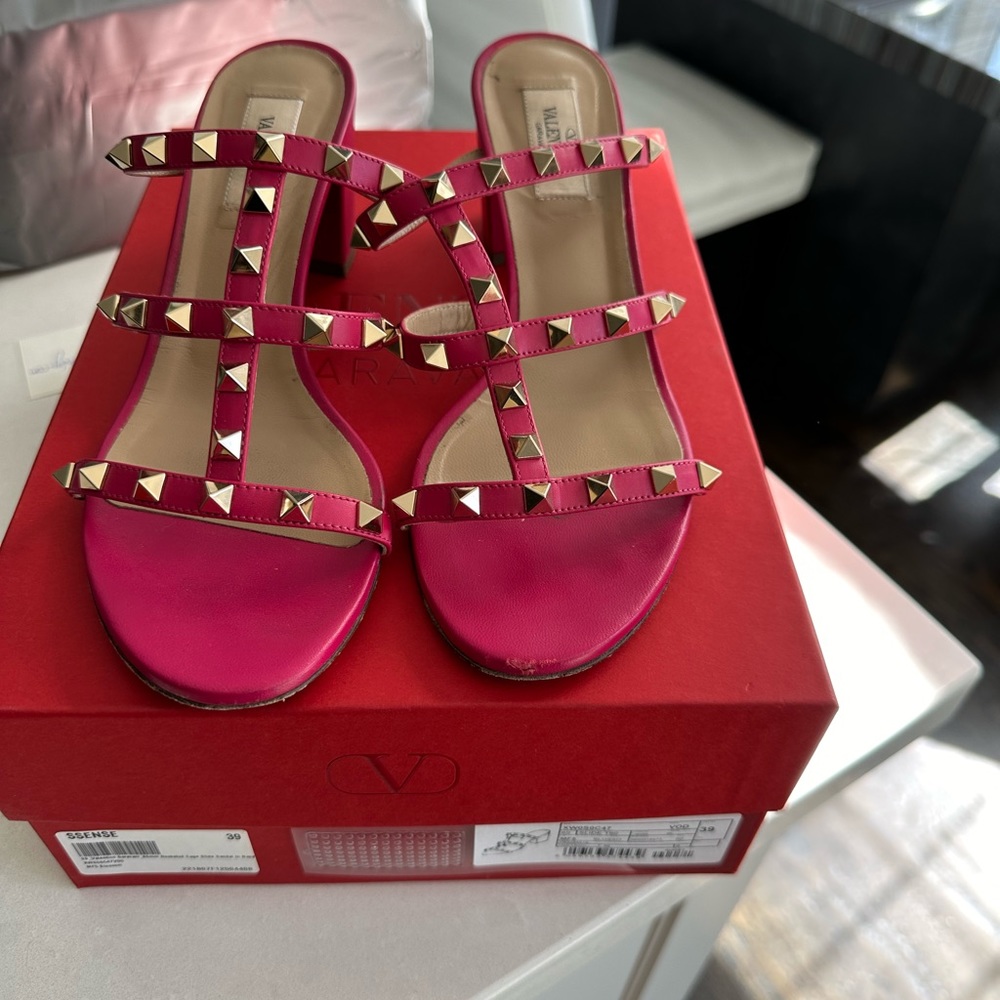 Valentino rock stud caged heel sandals.